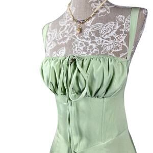 Whimsical milkmaid-inspired midi dress in soft mint